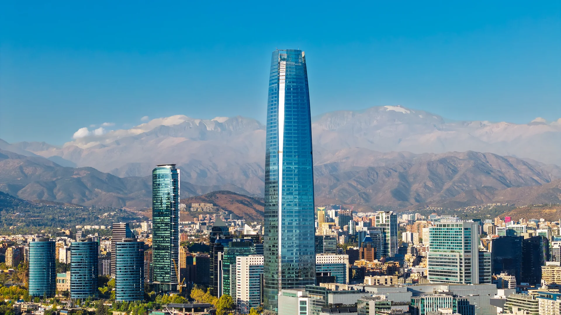Santiago city skyline backed by the snow-capped Andes, Chile