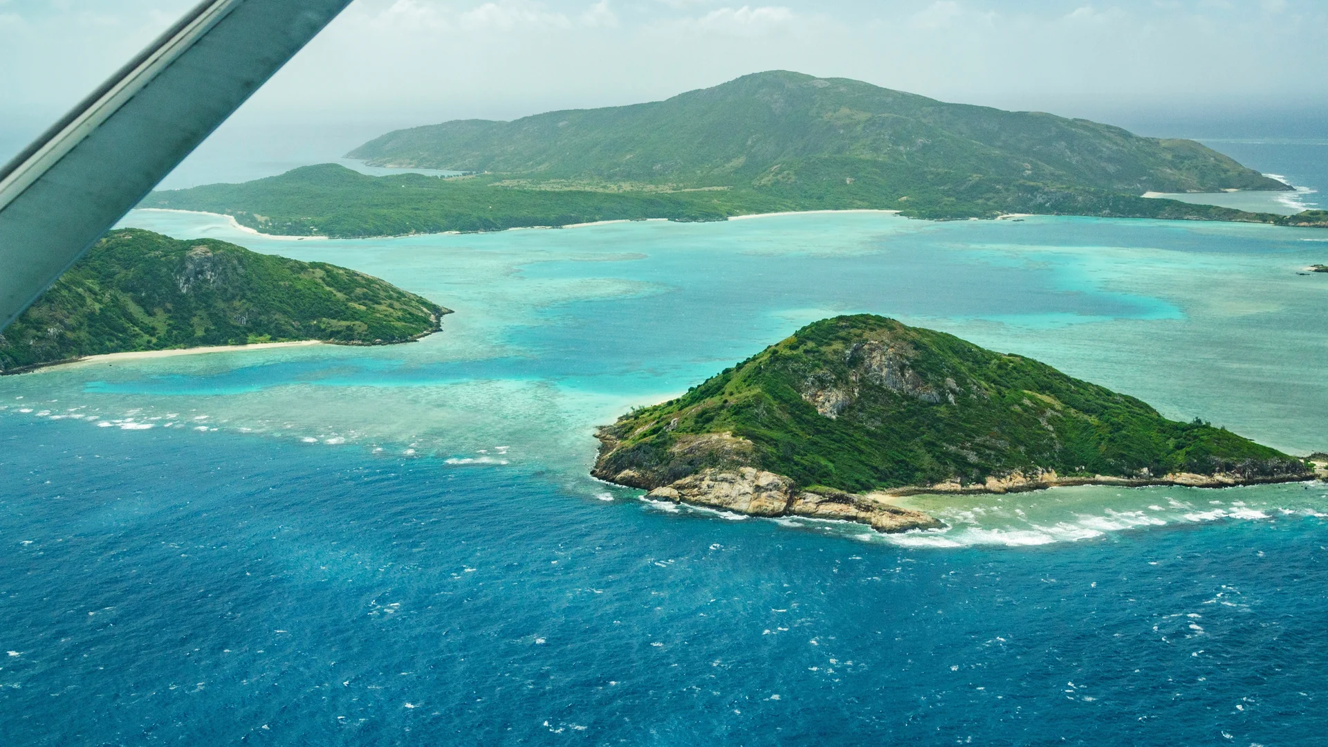 Aerial of Lizard Island and turquoise lagoon