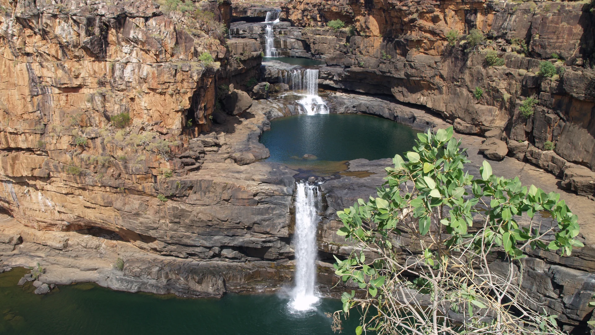 Iconic four-tiered Mitchell Falls with turquoise pools
