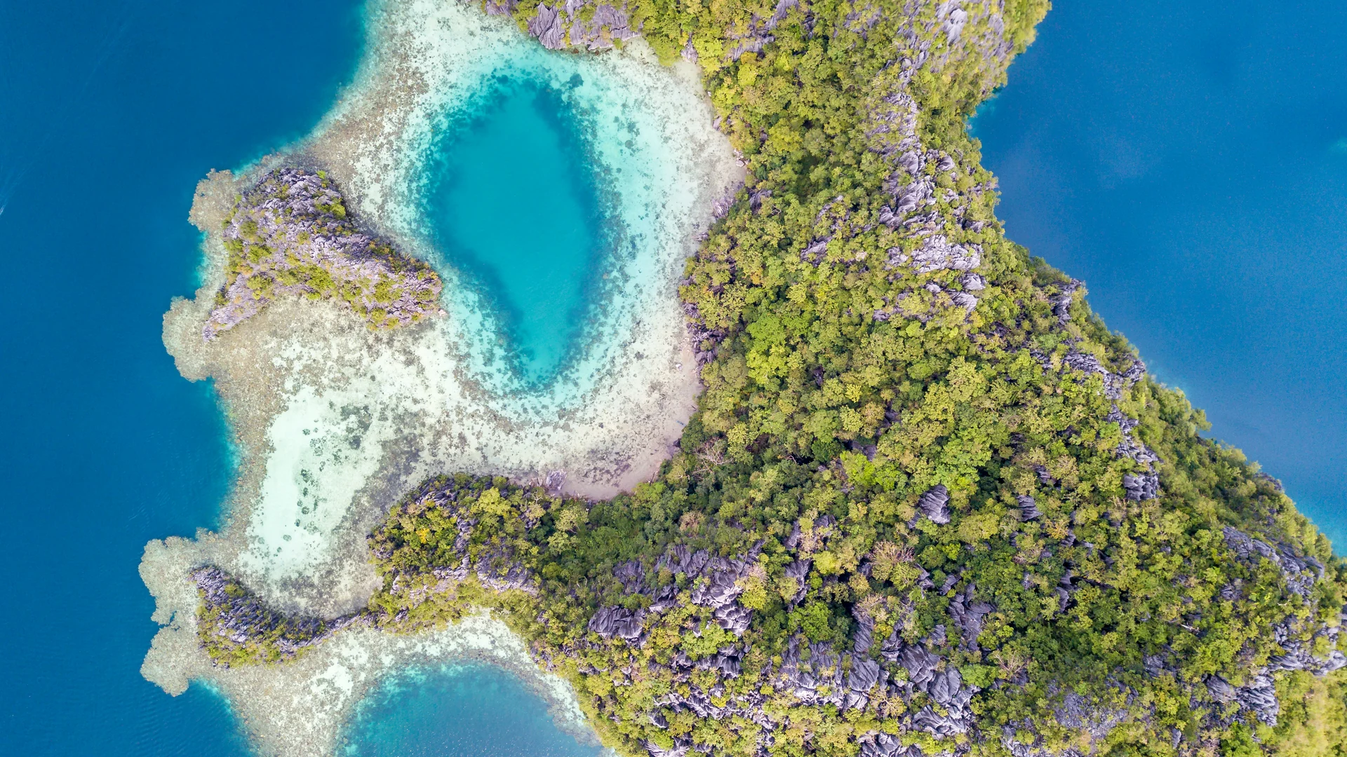 Low island with a turquoise lagoon, WA