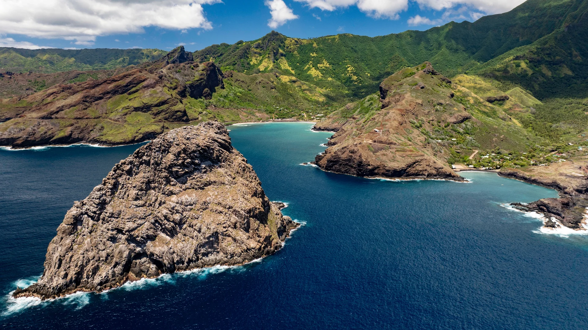 Aerial view of a rugged bay on the arid island of Ua Huka