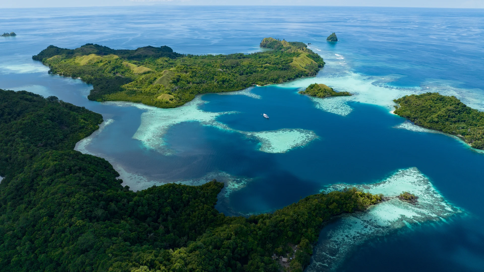 Reef-fringed rainforest island, Solomon Islands